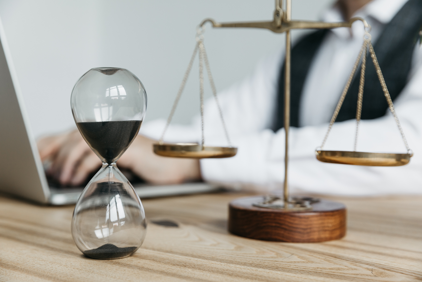 Male lawyer working with contract papers and wooden gavel on tabel in courtroom. justice and law , attorney, court judge, concept.